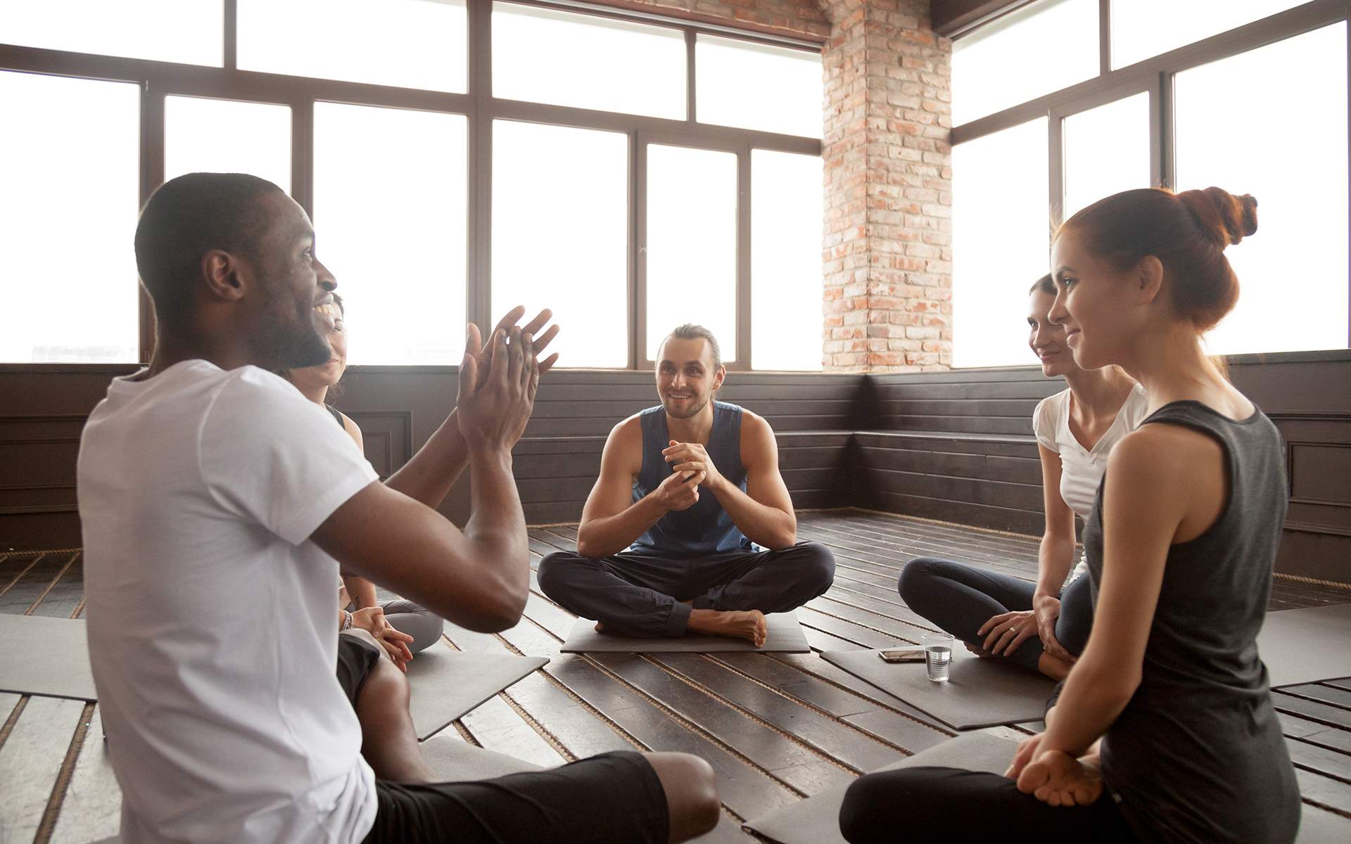 meditation teacher talking to students