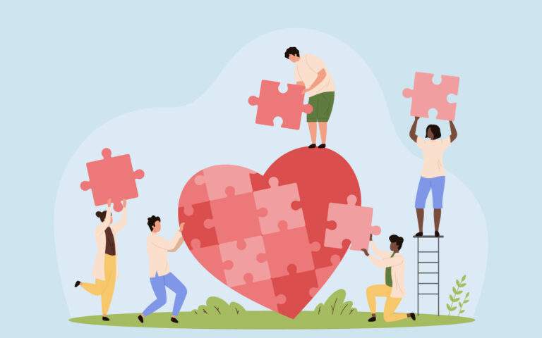Illustration of a big heart puzzle with five people all assembling the pieces