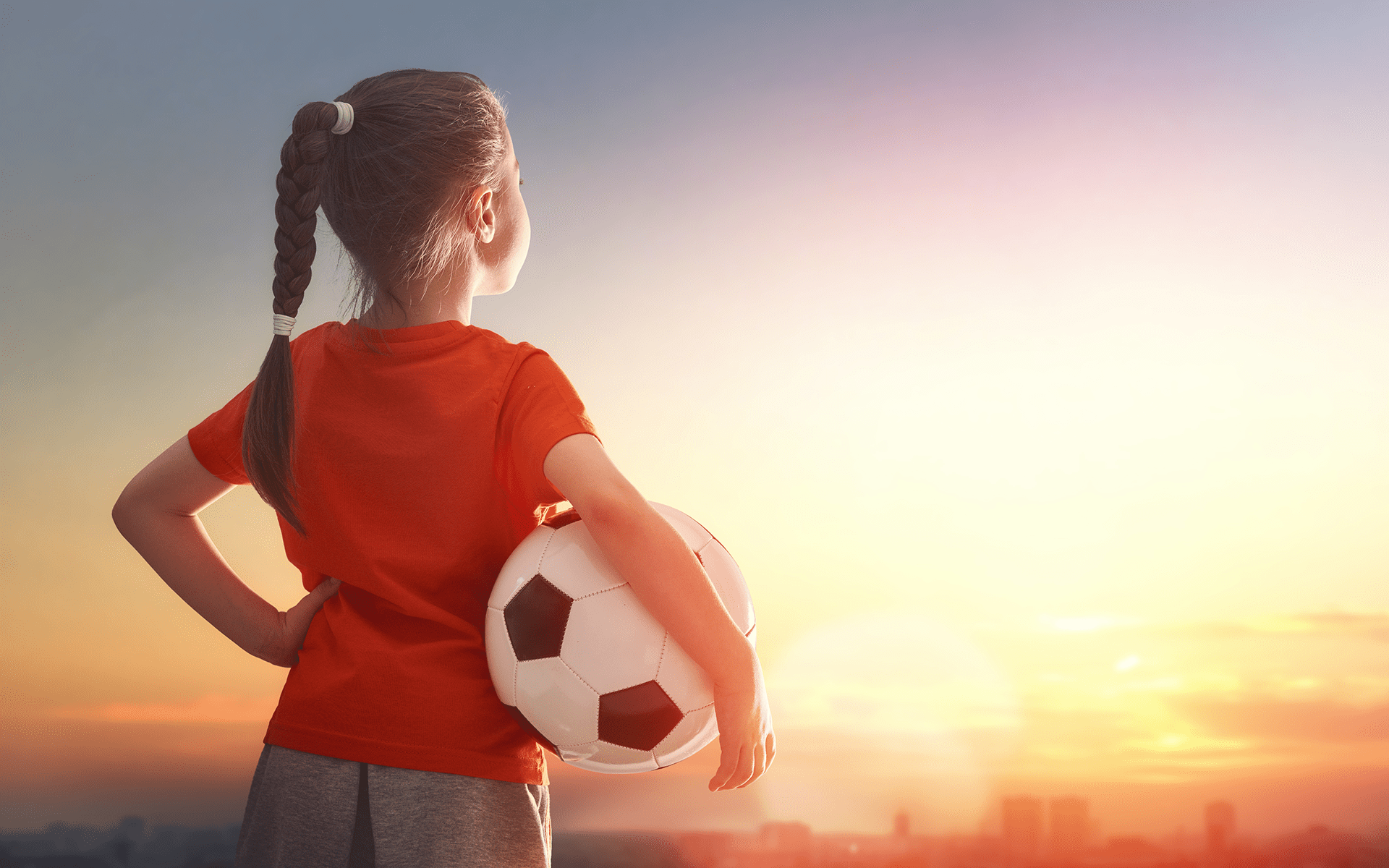 girl with soccer ball
