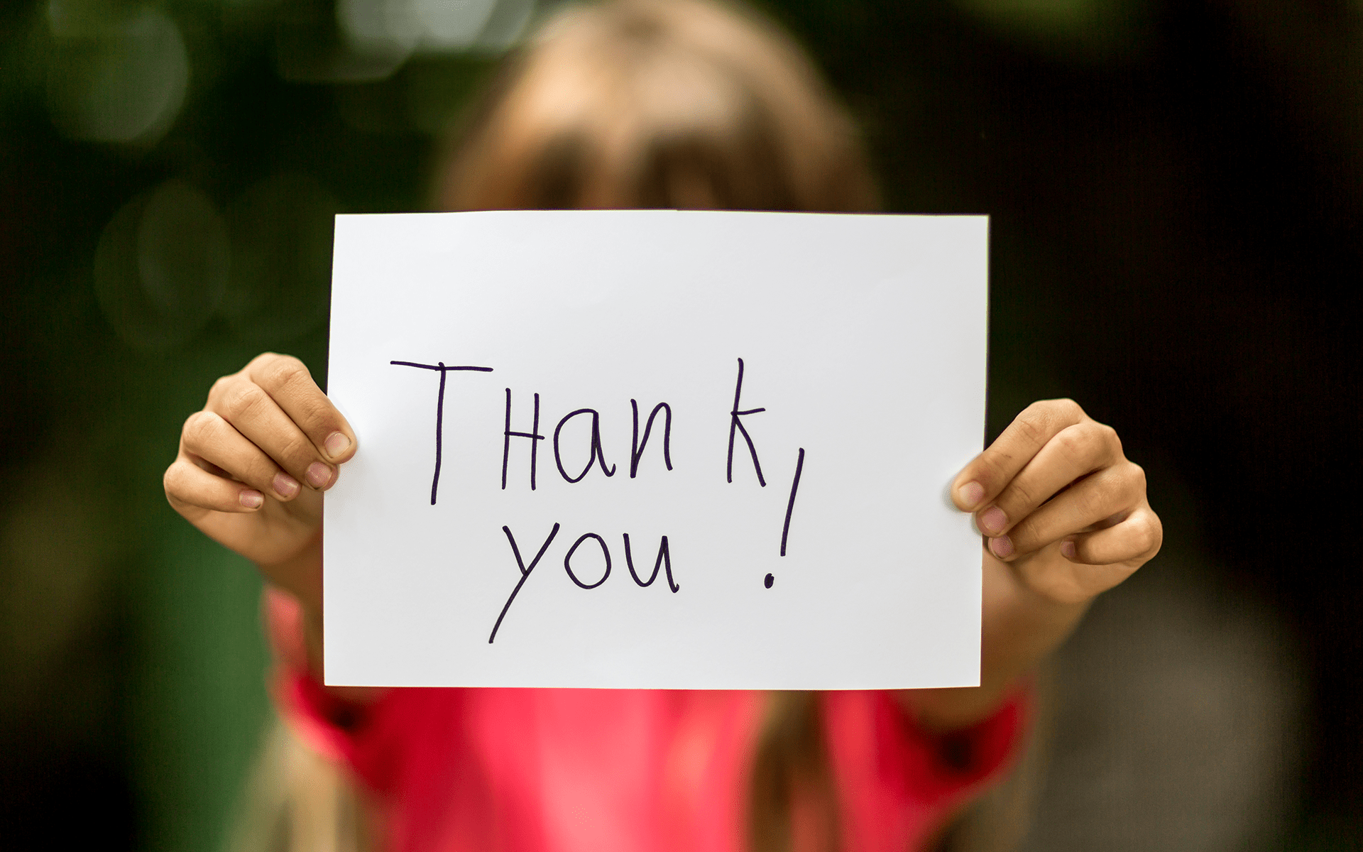 girl with thank you sign. gratitude